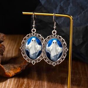 STAINLESS STEEL & SILVERY PLATED GHOST EARRING